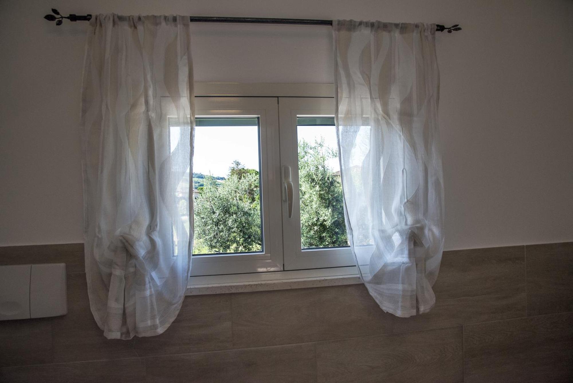Queen Appartamenti E Camere Campofilone Luaran gambar