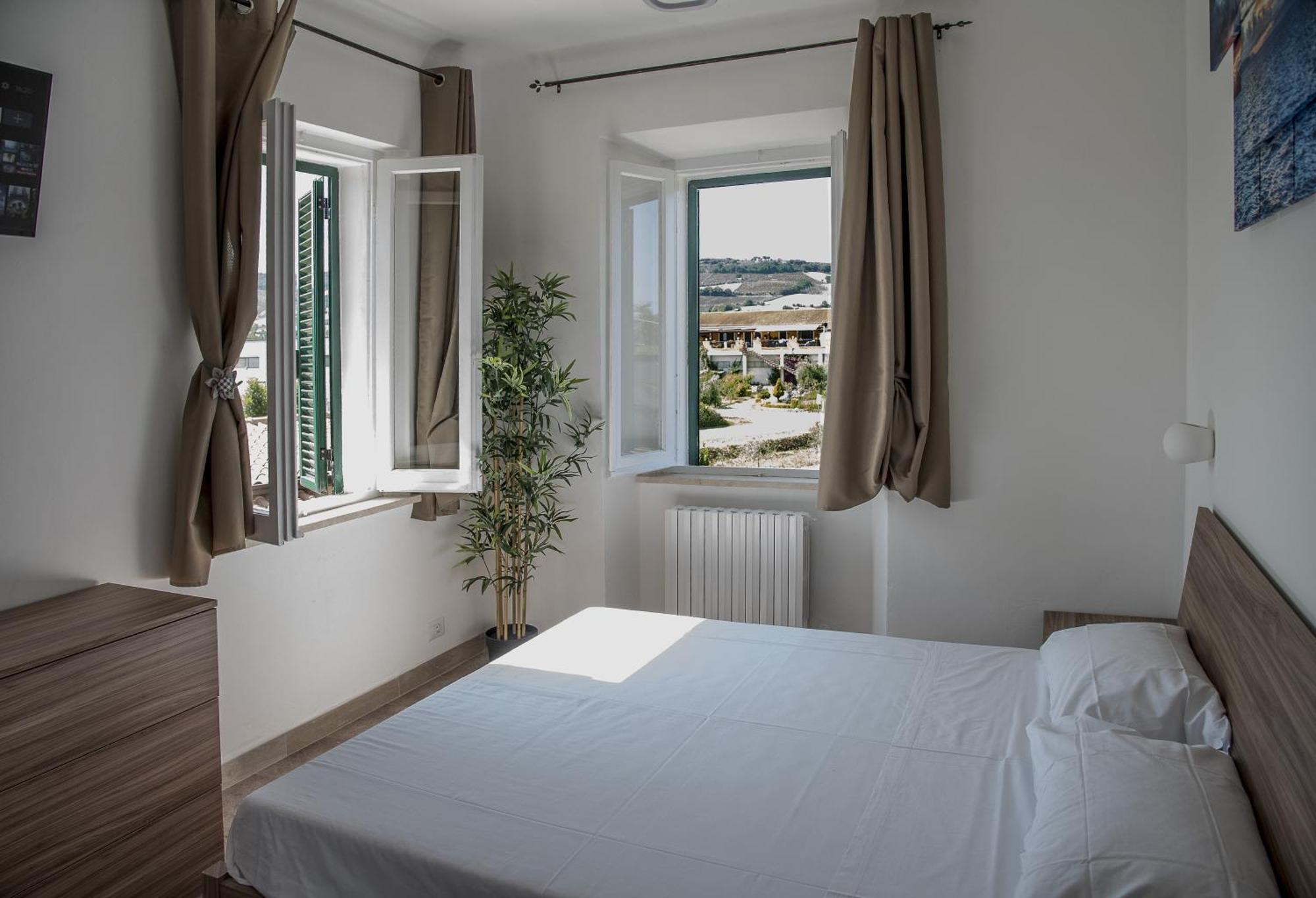 Queen Appartamenti E Camere Campofilone Luaran gambar